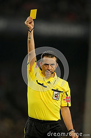 referee-ramirez-dominguez-delivers-yellow-card-thumb18440773.jpg