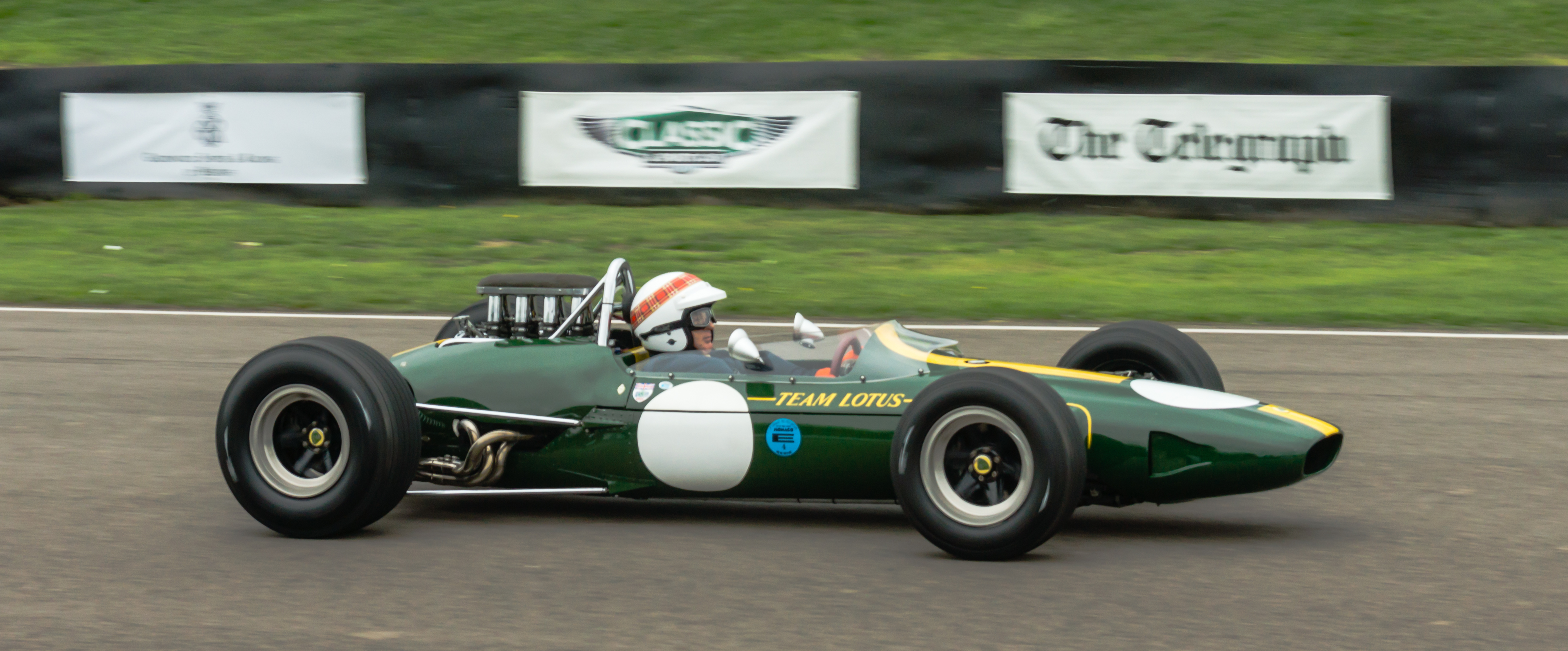 Lotus_33_Climax_Jackie_Stewart_at_Goodwood_Revival_2013_001.jpg